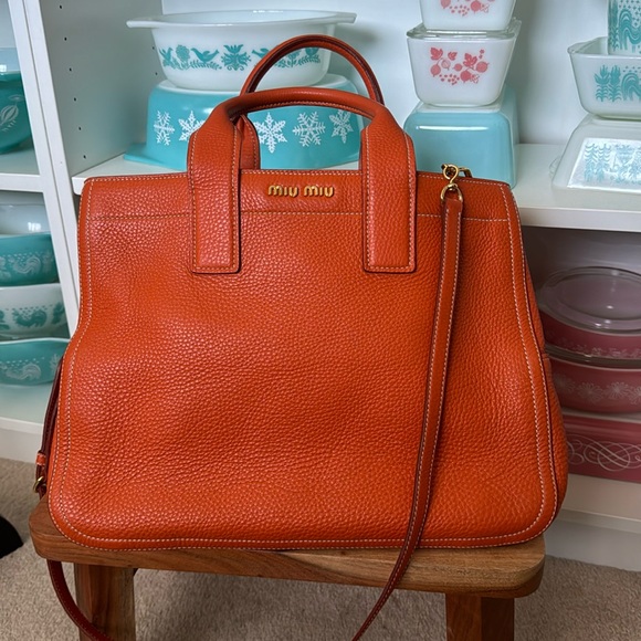 Miu Miu Handbags - Miu Miu top handle leather bag - authentic